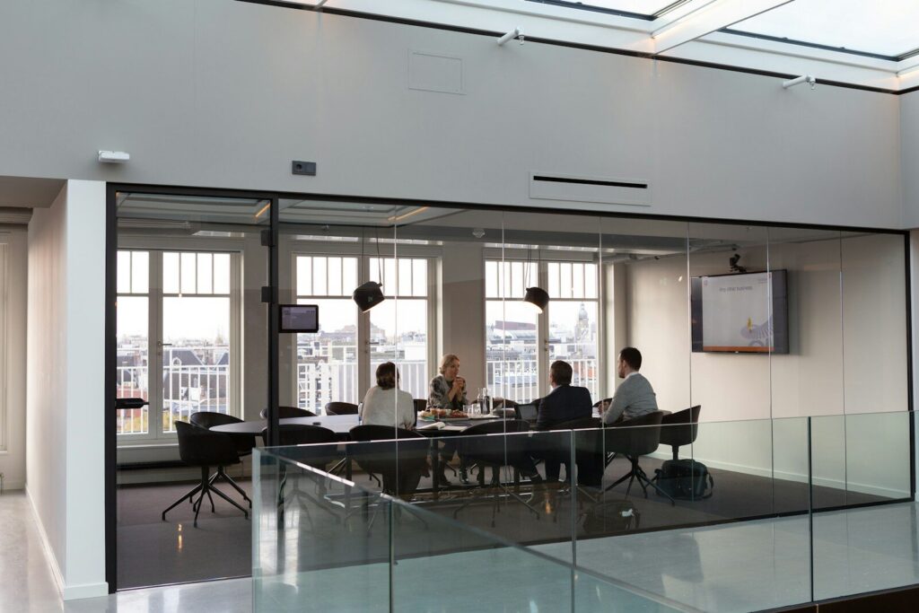 people sitting on chair inside building